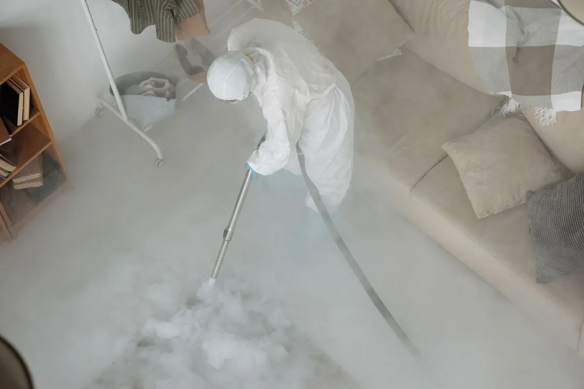 Biohazard cleanup technician in protective equipment, Haughton, LA